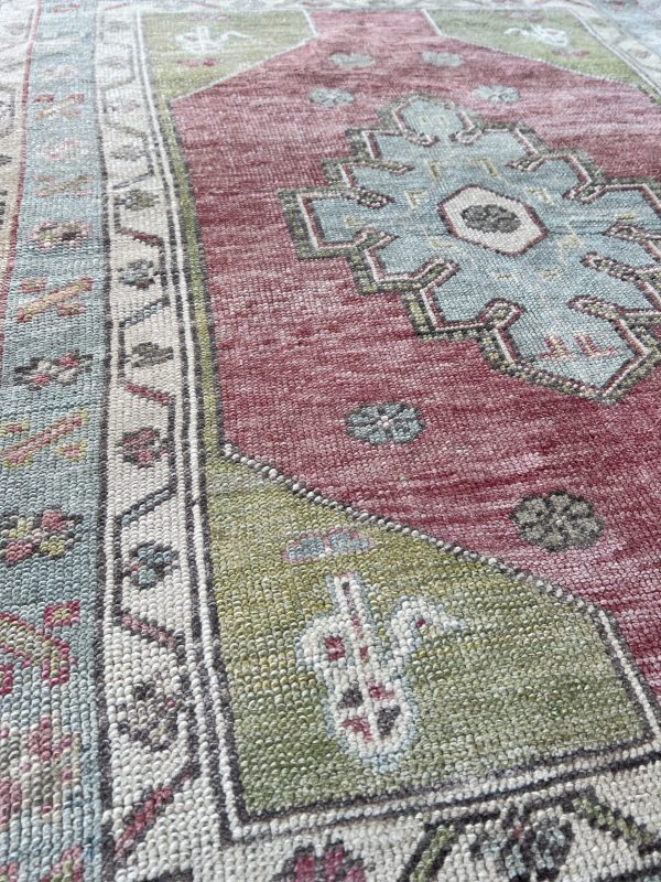 Decorative small Turkish rug for layering and styling